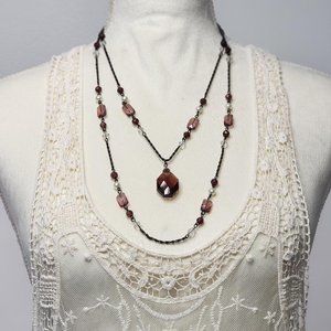 Victorian strand of polished and cut gem like stones.